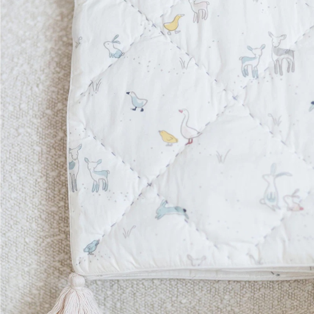 Pehr just hatched quilted blanket